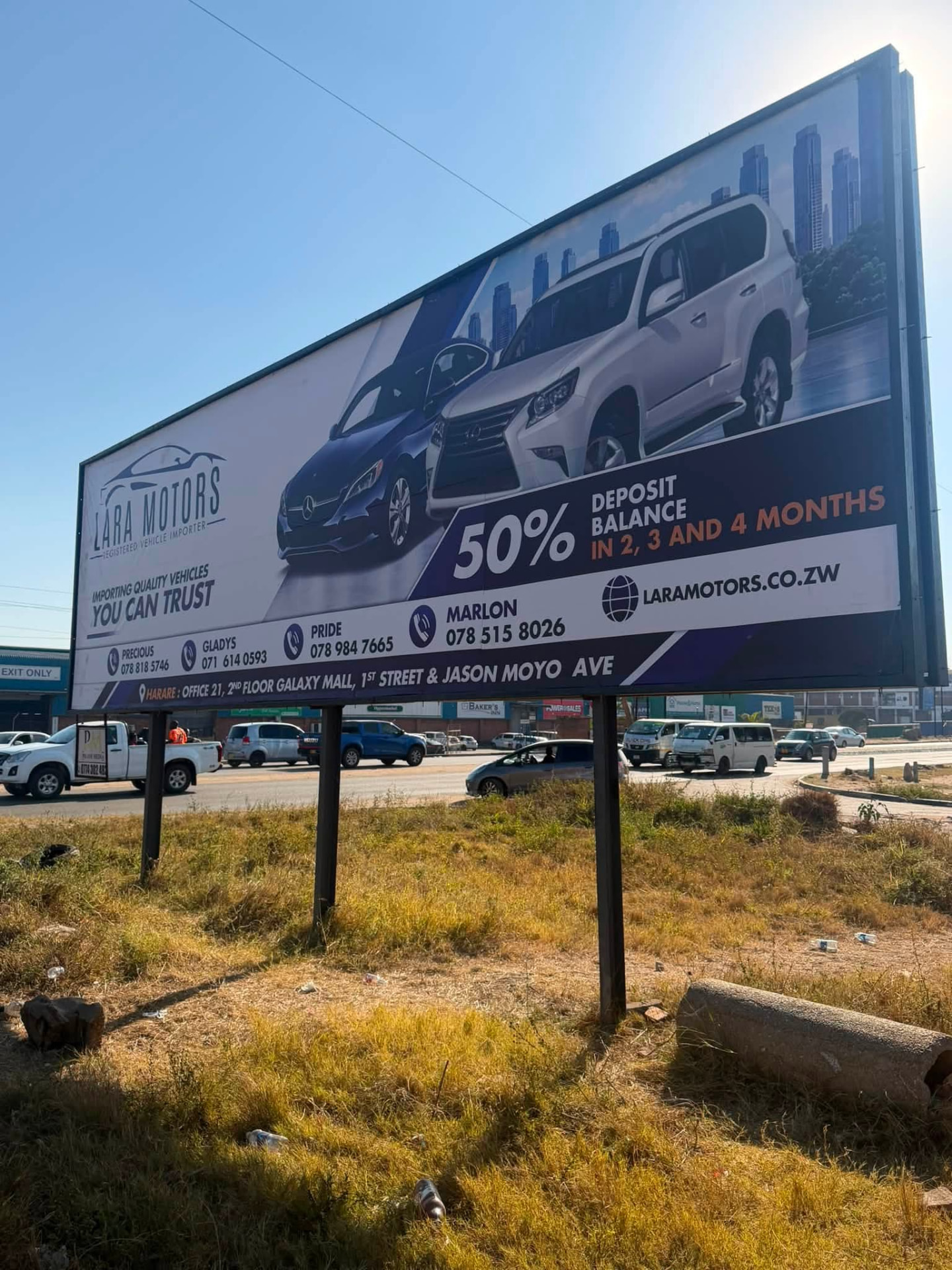 Lara Motors billboard in Harare advertising 50% deposit vehicle imports